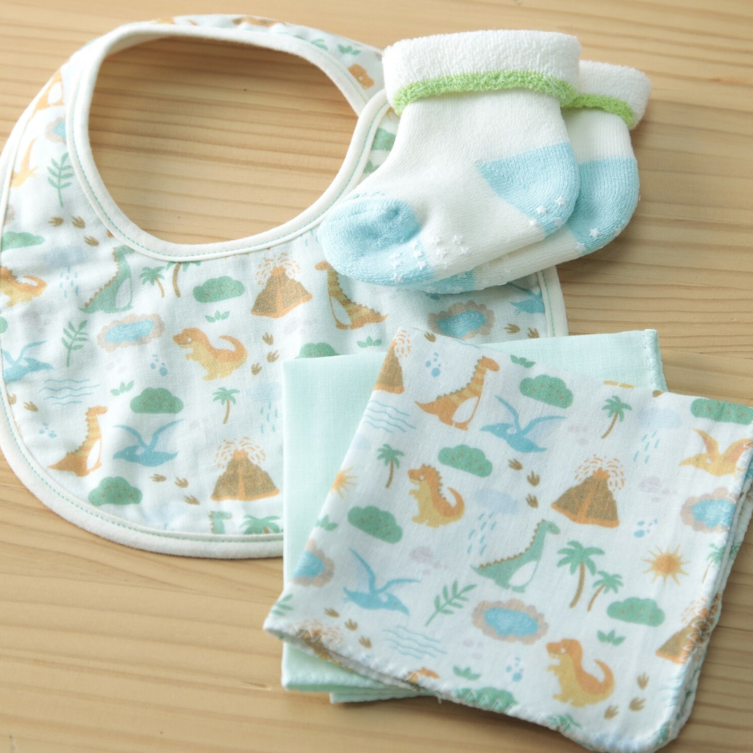 Green dinosaur Baby gift set from Japan with a round bib handkerchief socks